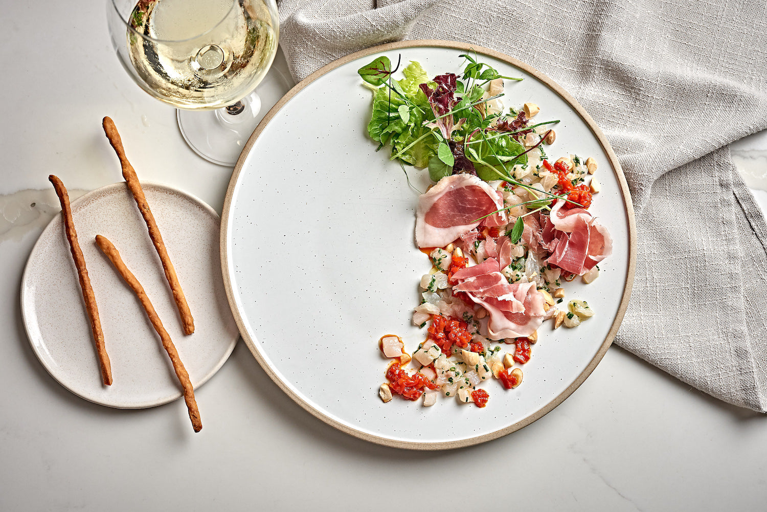 Cobia Crudo with Agrodolce Peppers, Almonds, Prosciutto