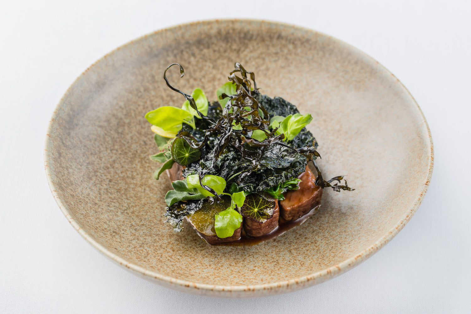 Lamb Loin, Caper Leaf, Orach, Young Garlic, Wakame