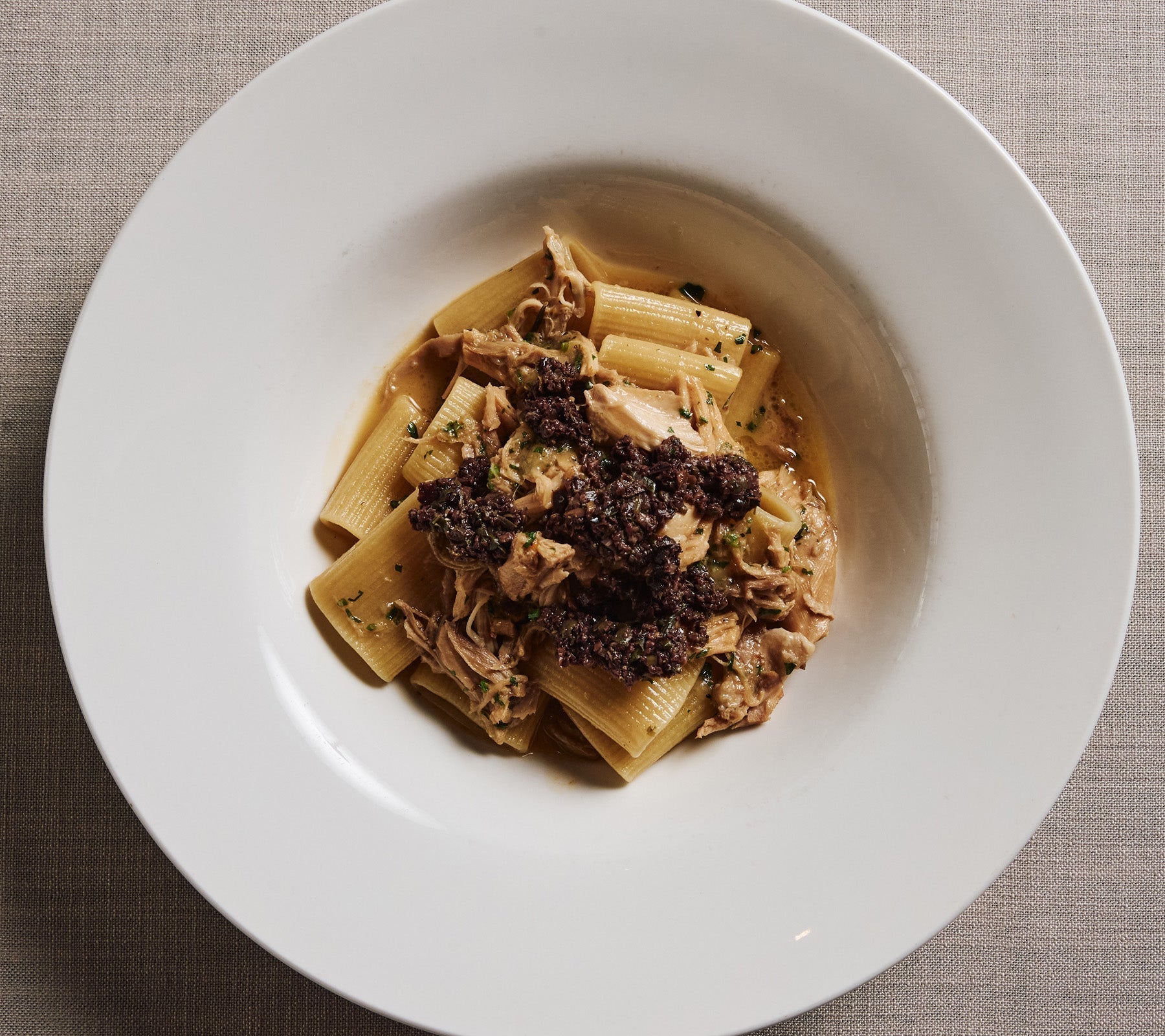 Paccheri, Rabbit Ragu, Golden Raisins, Capers, Olives