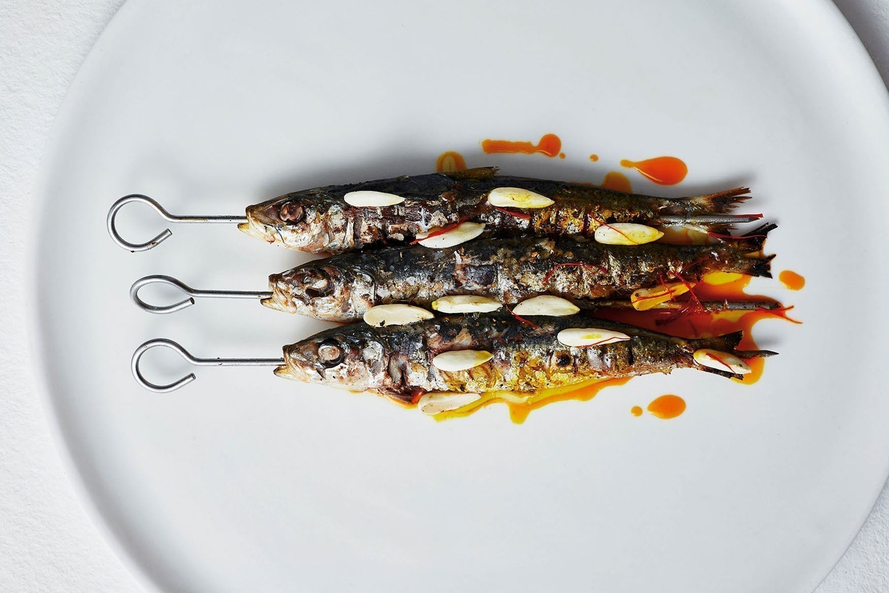 Charcoal Sardines, Saffron Vinegar, Almond Oil
