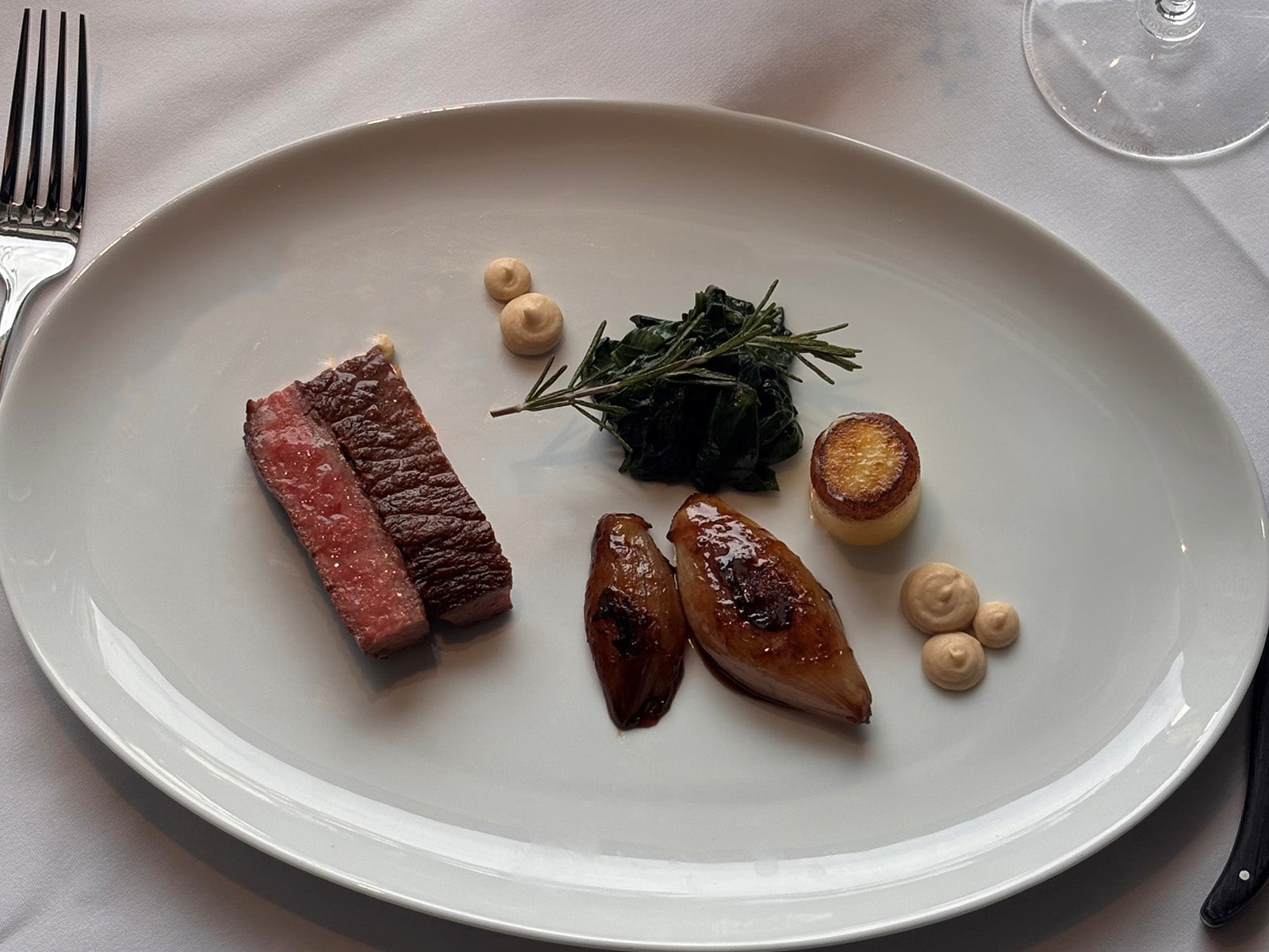 Wagyu Sirloin, Fondant Potato, Glazed Shallot, Wilted Spinach, Shiraz Jus